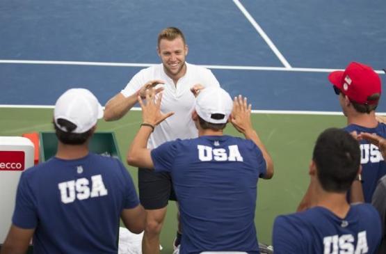 Jack Sock celebrates with his U.S. teammates after his win over Marin Cilic in previous Davis Cup competition.